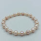 Perlenarmband in zarten Rosé- und Cremetönen
