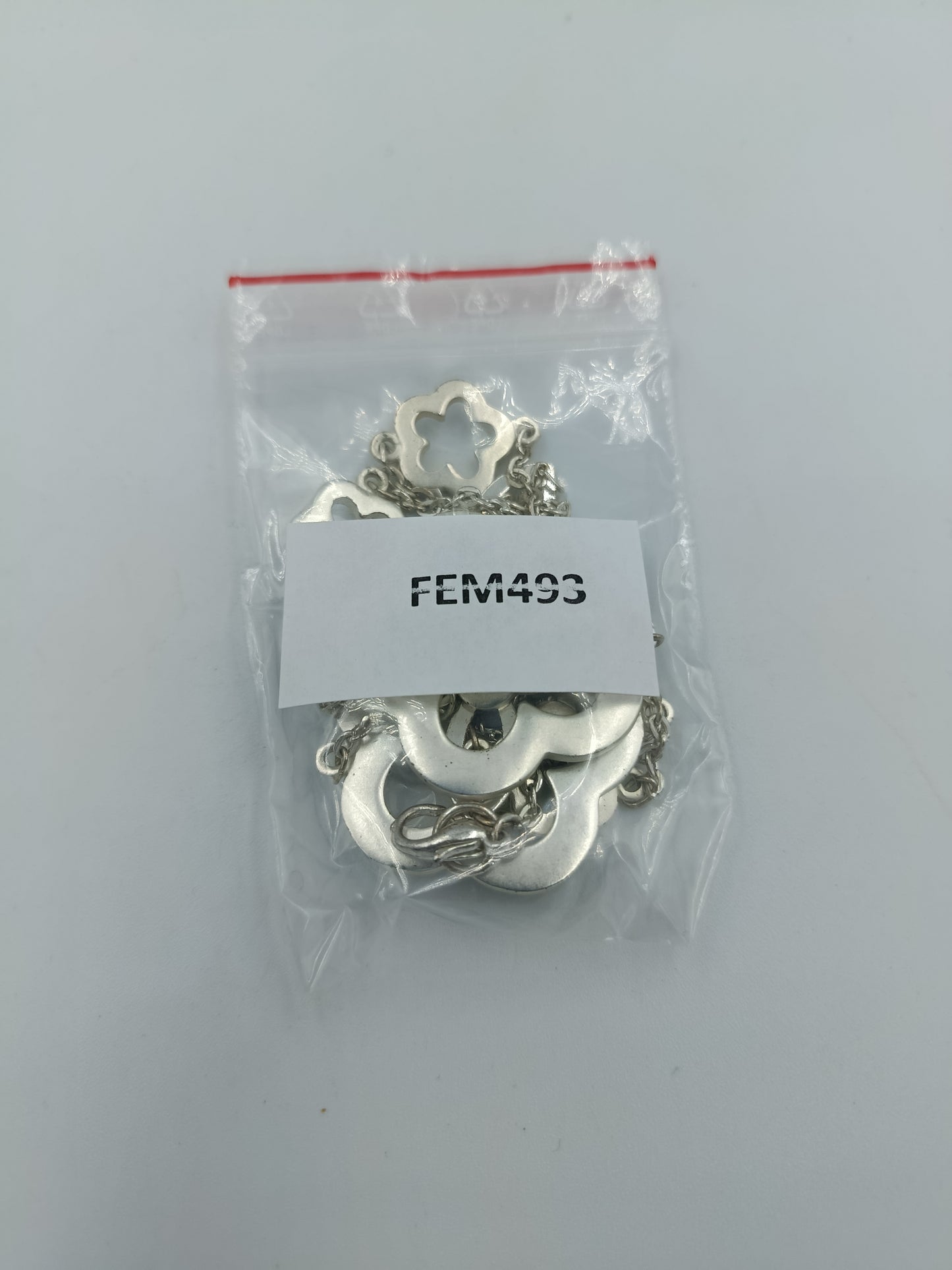 Lange Kette mit Blumen-Elementen