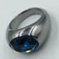 Silberfarbener Ring mit großem dunkelblauem Stein