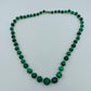Grüne Perlenkette mit Farbverlauf