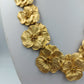 Opulente Statement Kette in Goldblüten Design