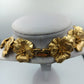 Opulente Statement Kette in Goldblüten Design