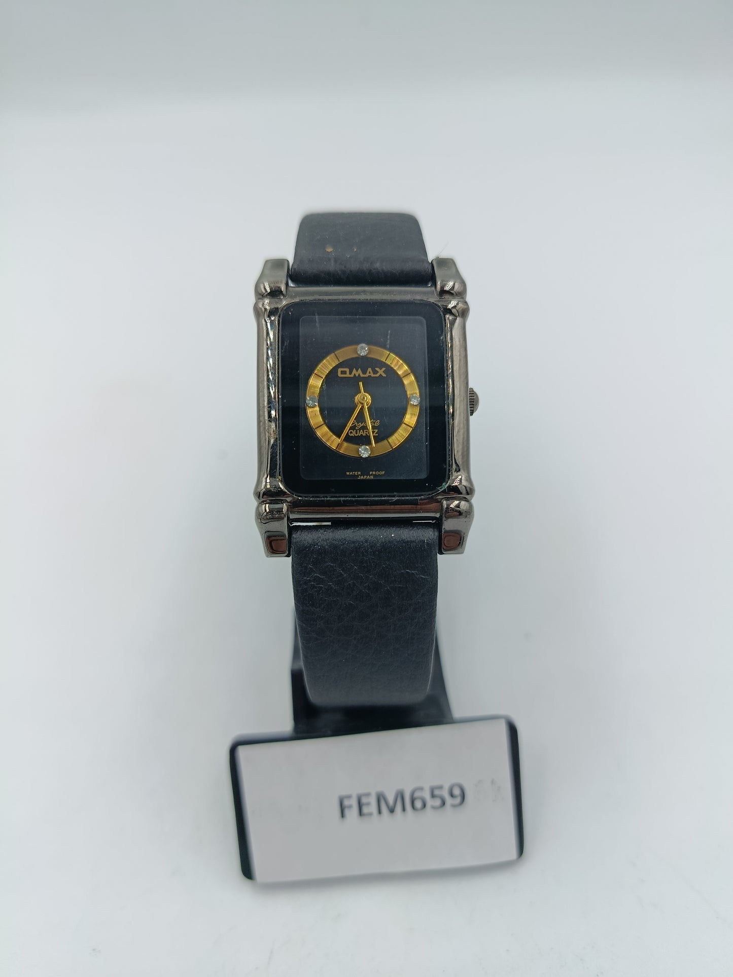 Omax Armbanduhr Schwarz Gold Rechteckig Lederband Elegant