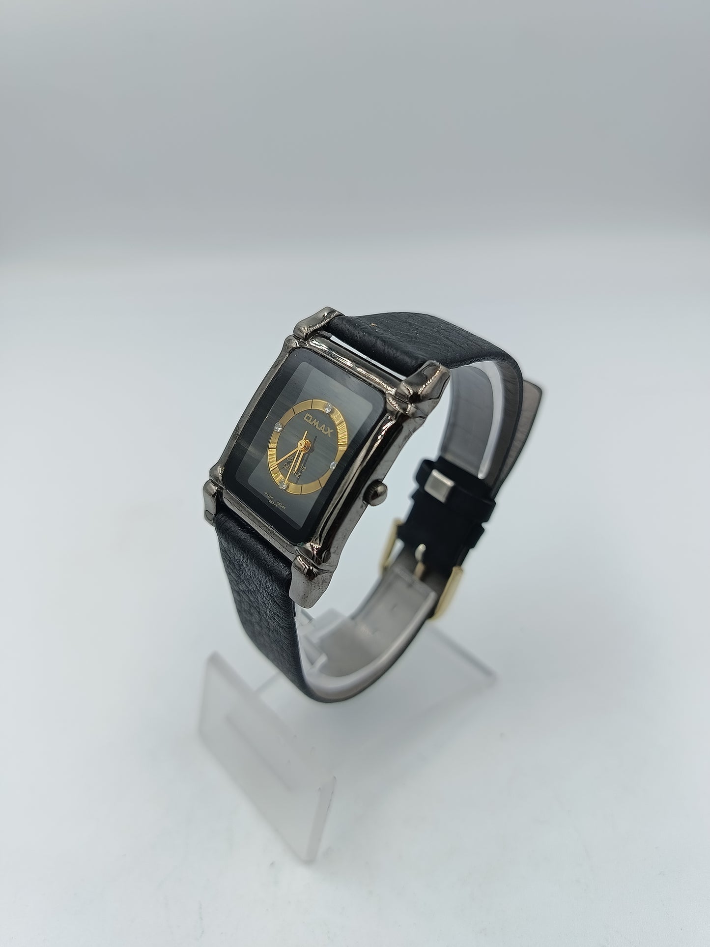 Omax Armbanduhr Schwarz Gold Rechteckig Lederband Elegant