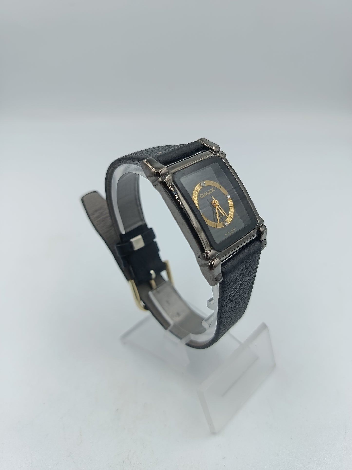 Omax Armbanduhr Schwarz Gold Rechteckig Lederband Elegant