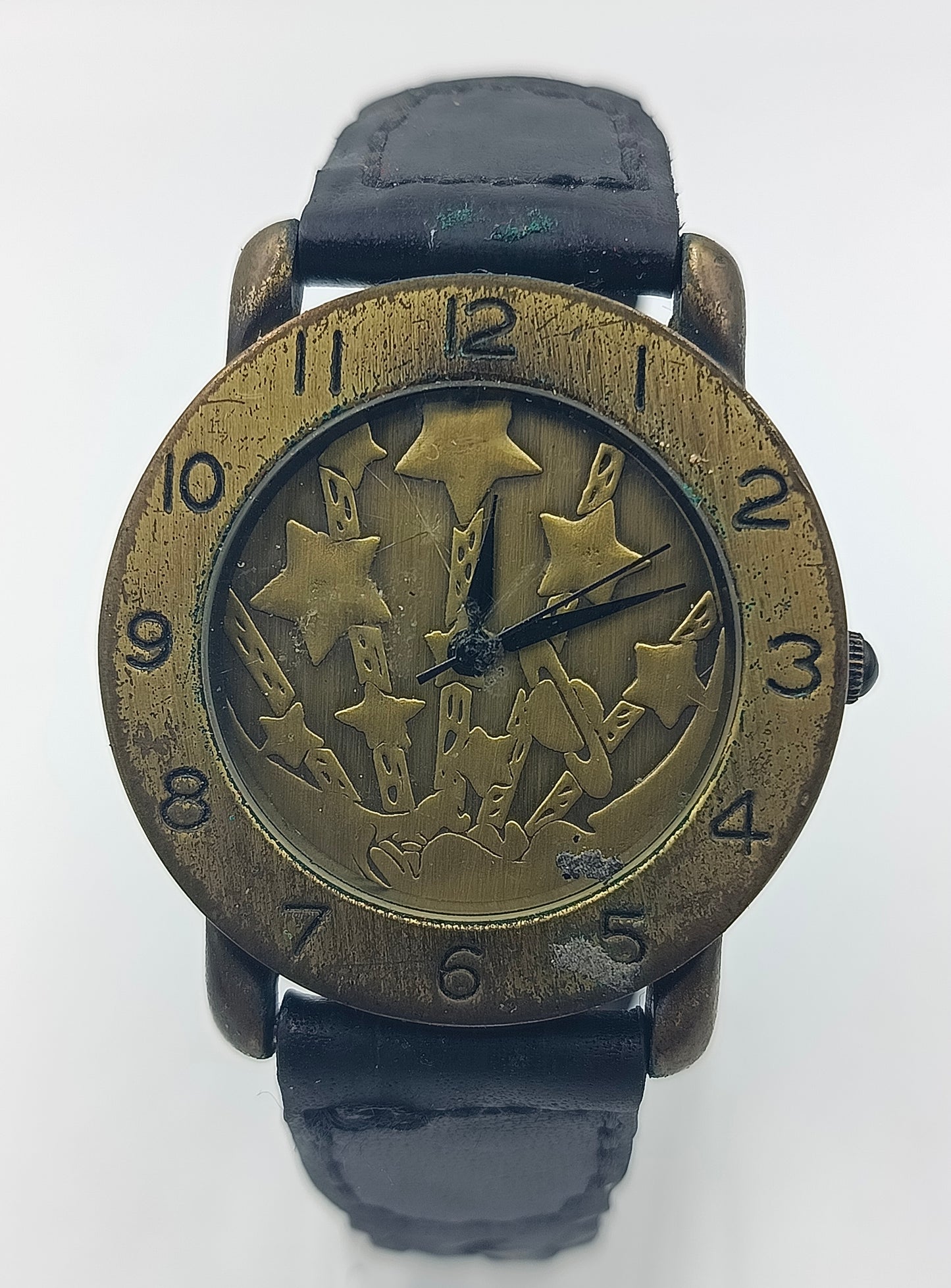 New Generation Armbanduhr Bronze Sterne Design Lederarmband