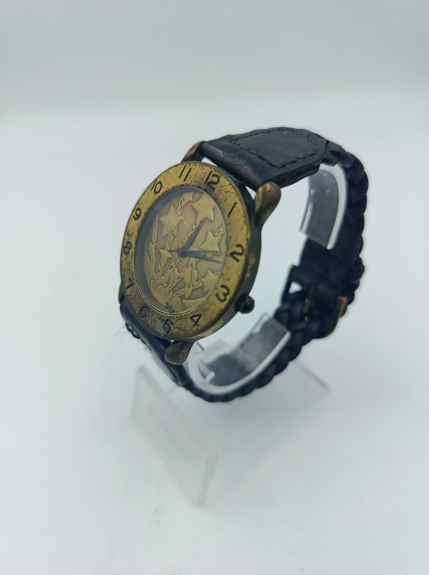 New Generation Armbanduhr Bronze Sterne Design Lederarmband