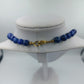 Halskette mit blauen Perlen und goldfarbenem Verschluss