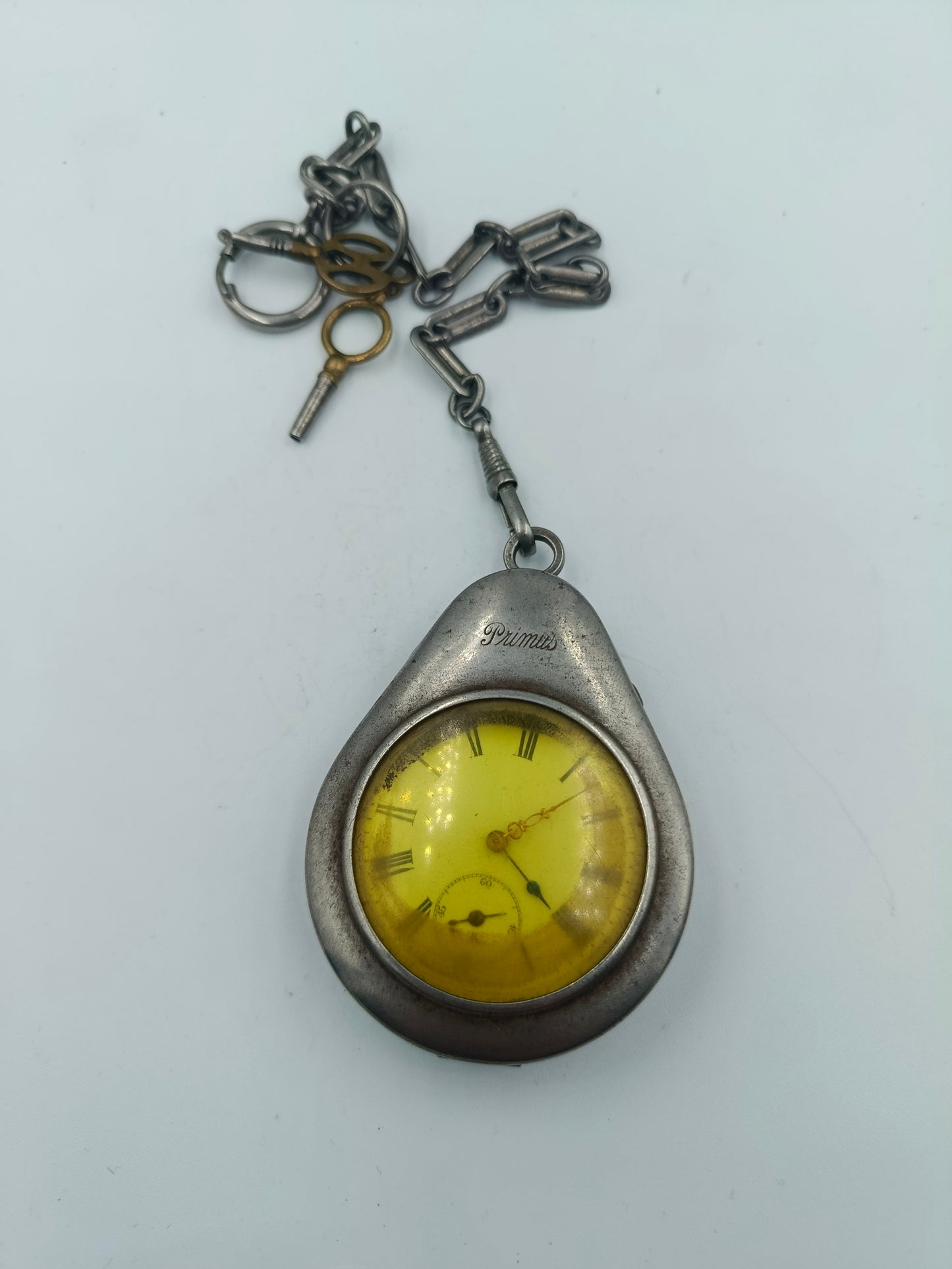 Antike Schlüsselaufzug Taschenuhr Primus mit Kette und Schlüsseln