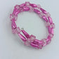 Elastisches Armband Rosa mit transparenten Würfelperlen