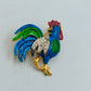 Farbenfrohe Hahn Brosche goldfarben mit Emaille und Strasssteinen