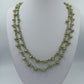 Grüne Perlenkette mit Glasperlen und silberfarbenen Akzenten