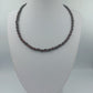Dunkelbraune Holzkette im Naturstil handgearbeitet in ovaler Form