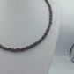 Dunkelbraune Holzkette im Naturstil handgearbeitet in ovaler Form