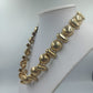 Goldfarbene Vintage Halskette mit Gliederelementen