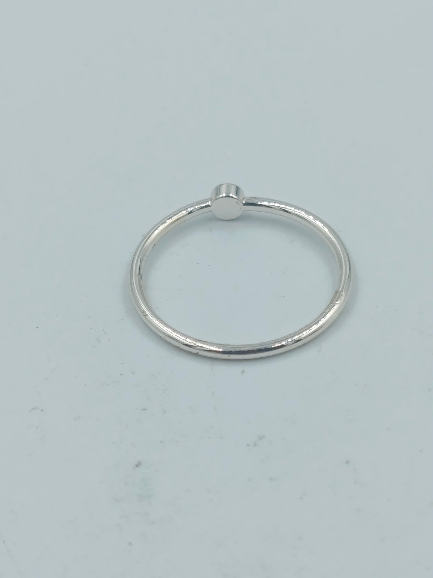 Feiner silberfarbener Ring mit rosa Stein Größe 54