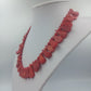 Rote Statementkette mit tropfenförmigen Elementen im Ethno Stil