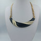 Statementkette Goldfarben mit schwarzem und cremefarbenem Dekor