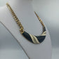 Statementkette Goldfarben mit schwarzem und cremefarbenem Dekor