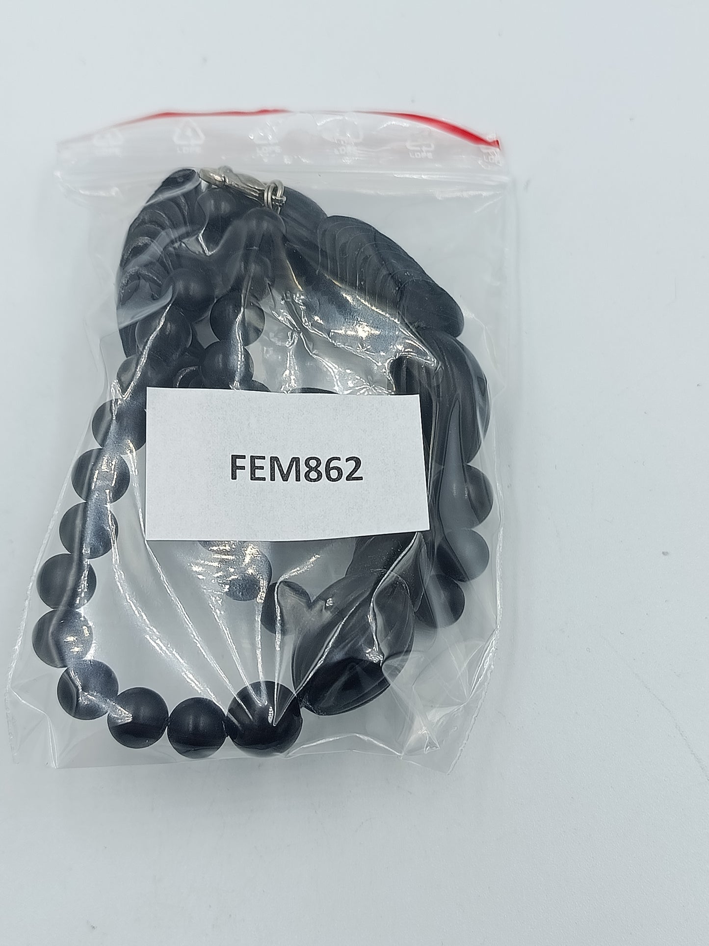 Schwarze Designer Halskette mit runden und gedrehten Perlen im modernen Statement Look