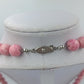 Lange rosa Kugelperlenkette mit marmorierter Struktur im eleganten Vintage Stil