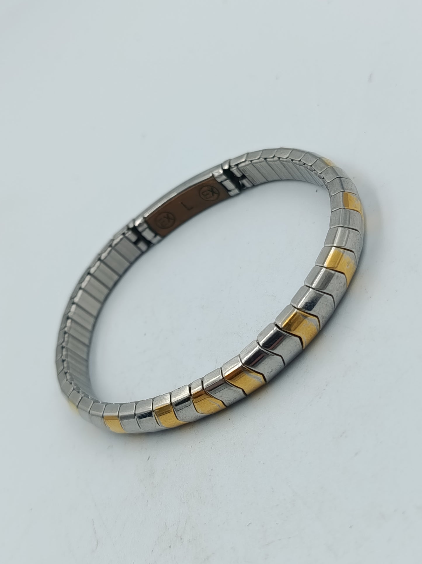 Zweifarbiges elastisches Armband in Silber und Goldoptik