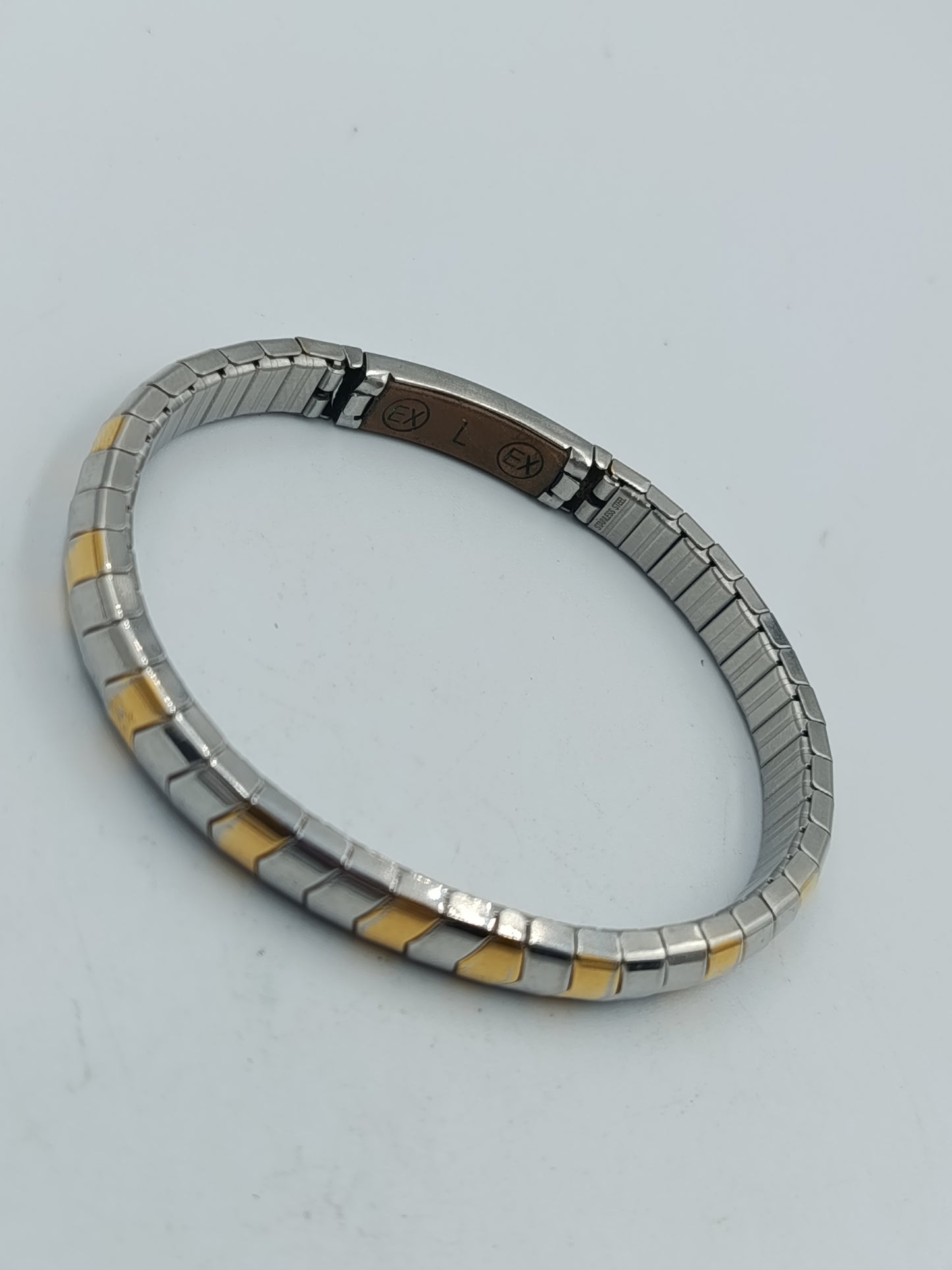 Zweifarbiges elastisches Armband in Silber und Goldoptik