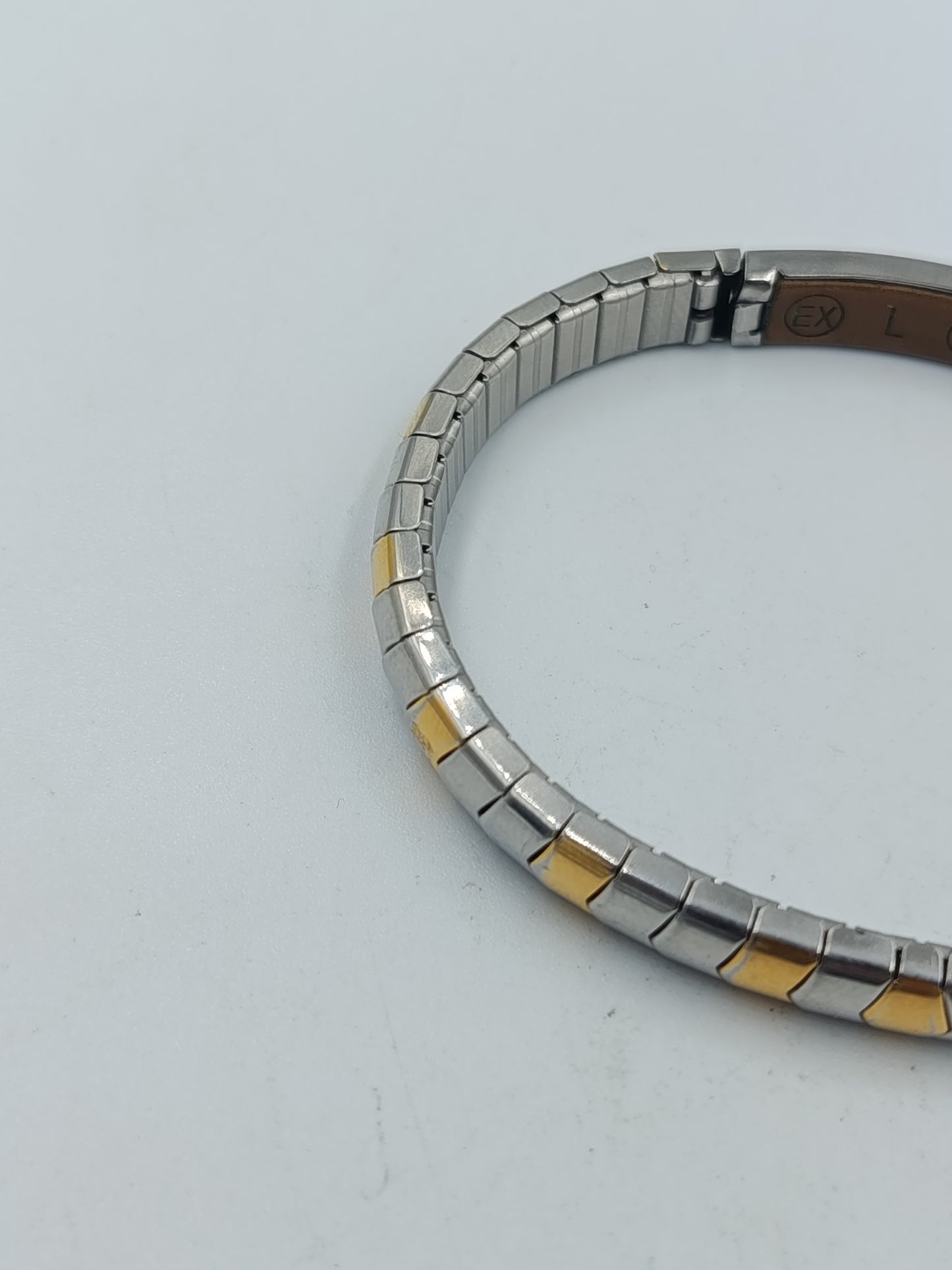 Zweifarbiges elastisches Armband in Silber und Goldoptik