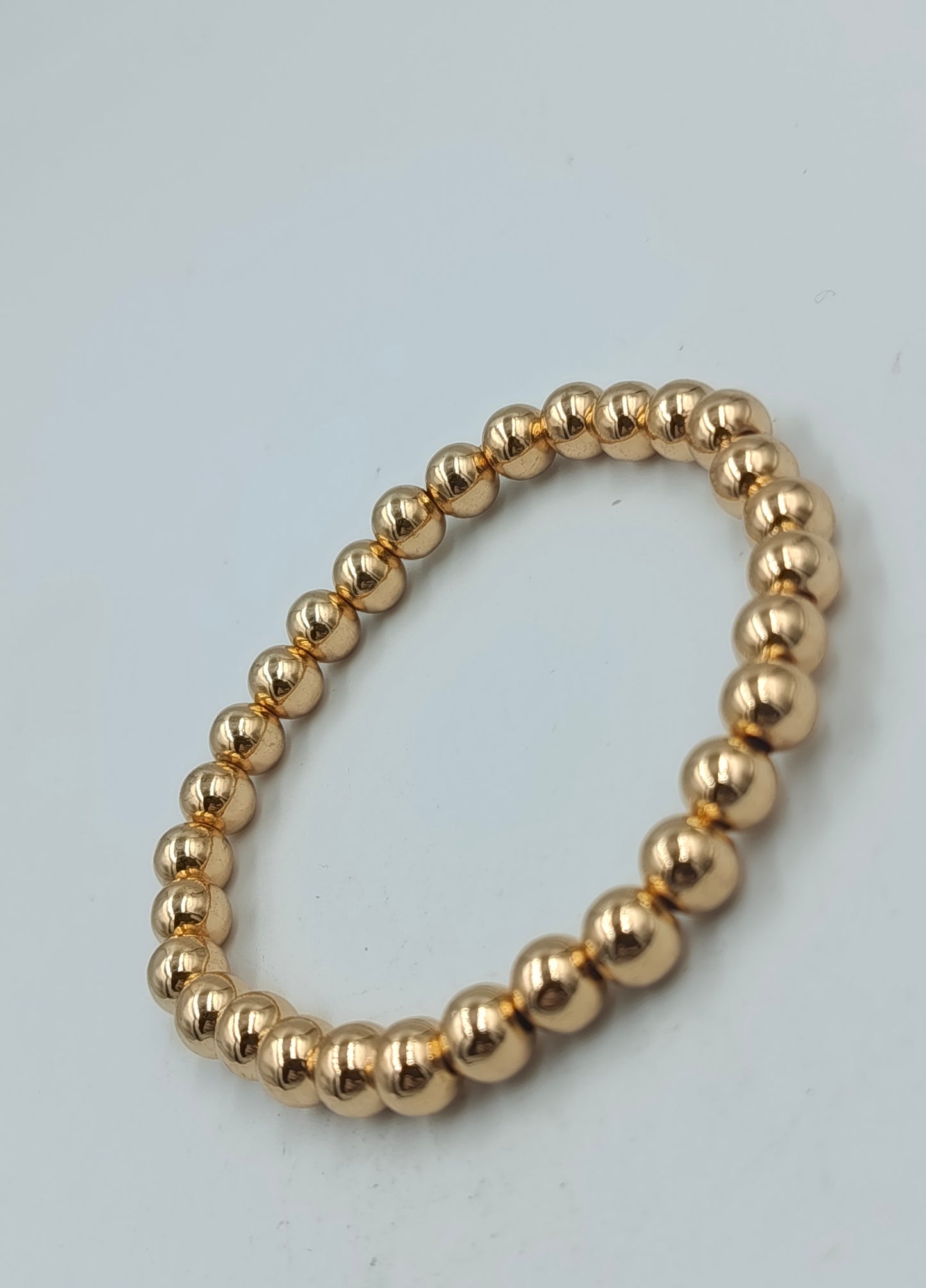 Elastisches Armband goldfarben Kugeln Stretcharmband