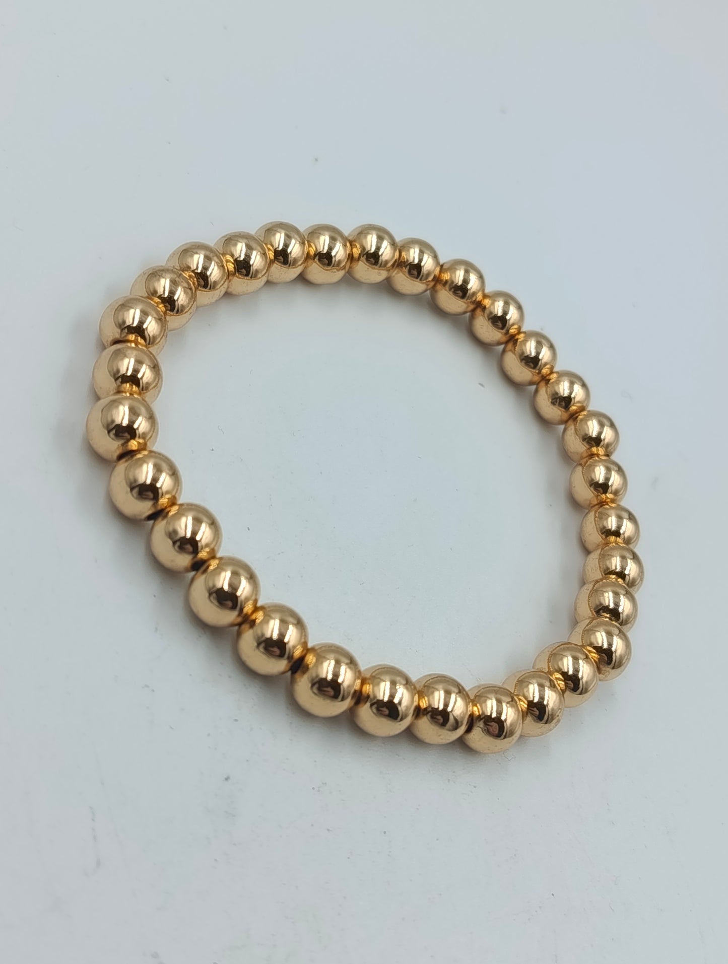 Elastisches Armband goldfarben Kugeln Stretcharmband