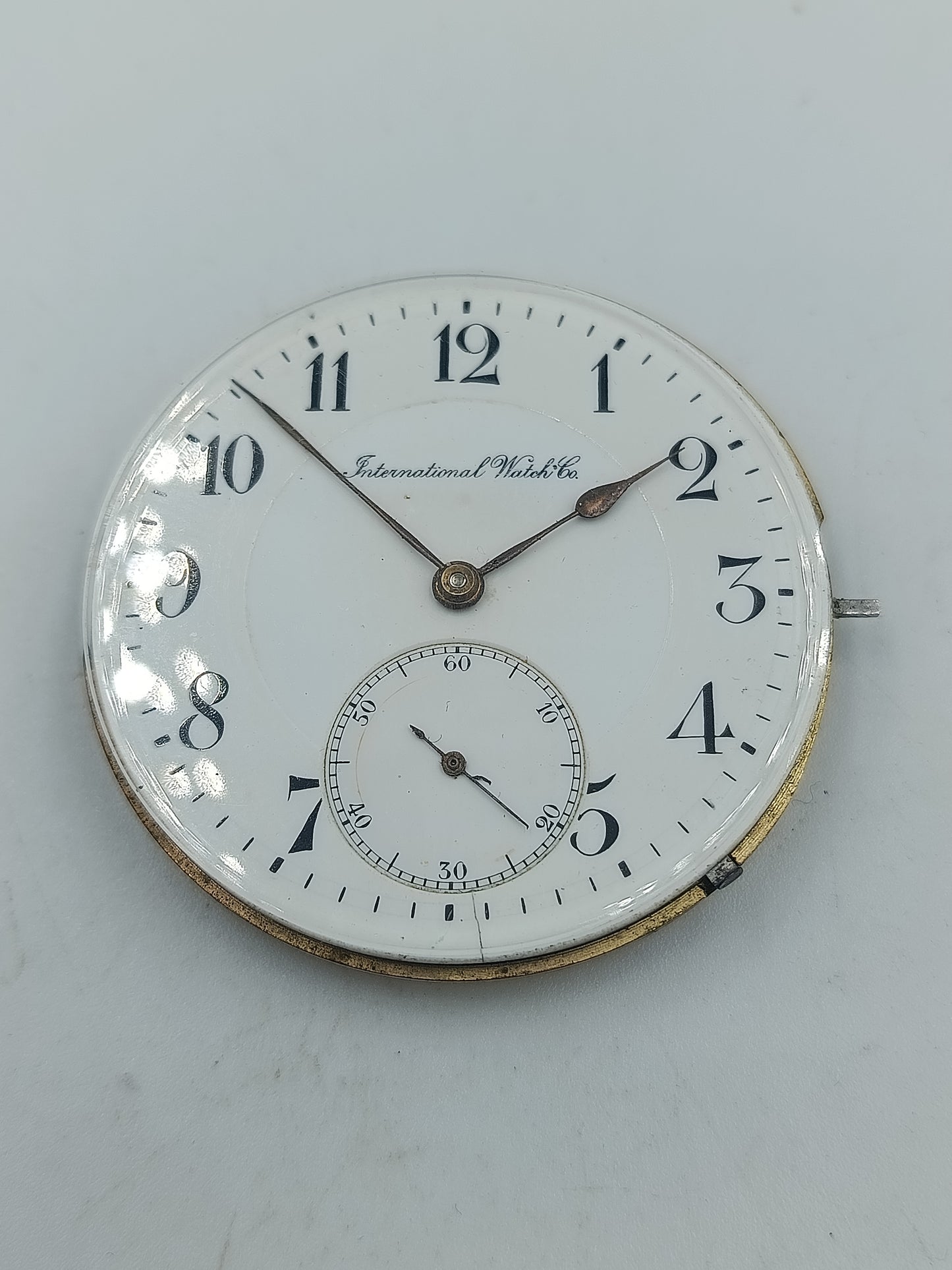 International Watch Co Taschenuhrwerk mit Emaille Zifferblatt