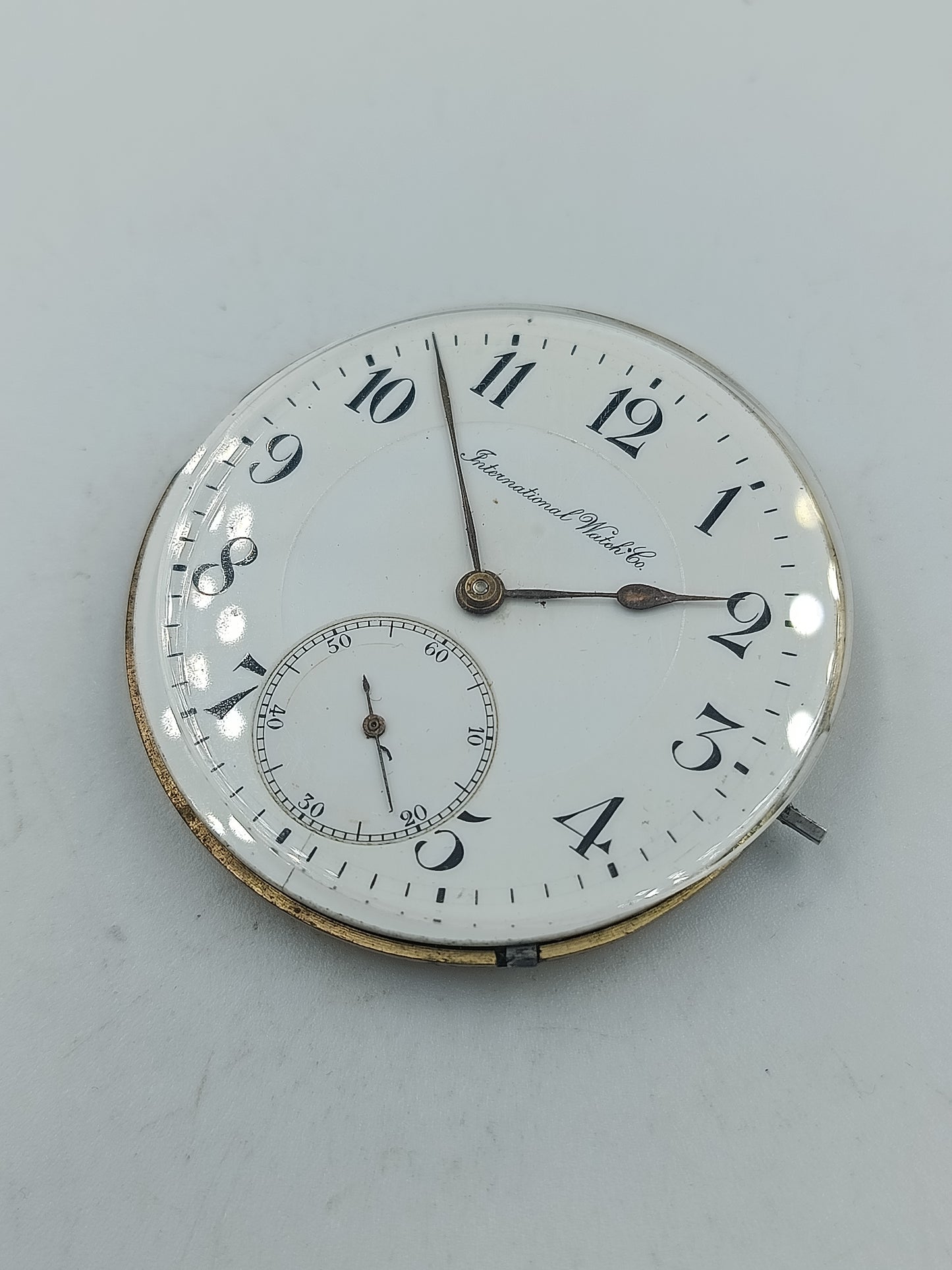 International Watch Co Taschenuhrwerk mit Emaille Zifferblatt