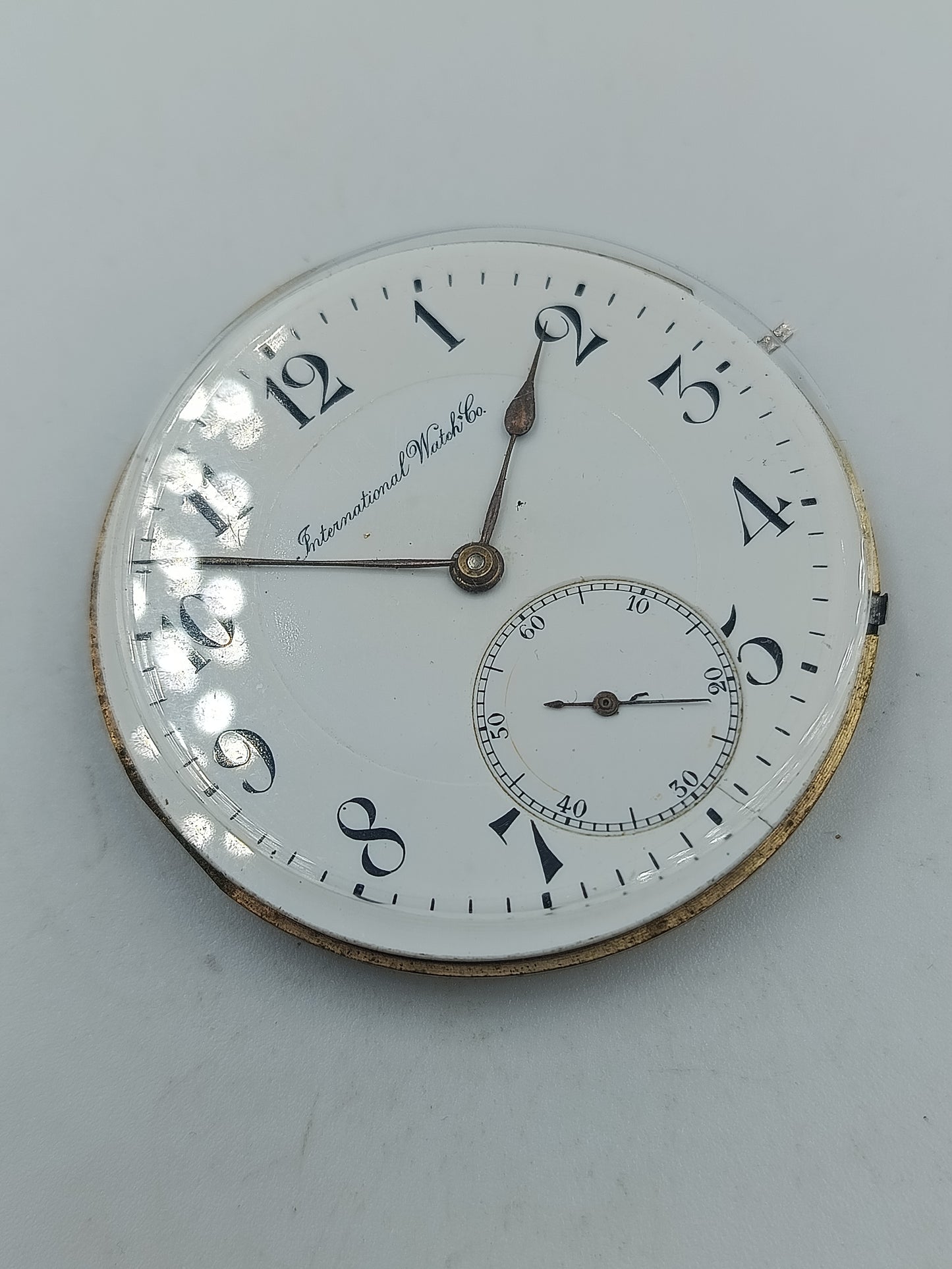 International Watch Co Taschenuhrwerk mit Emaille Zifferblatt
