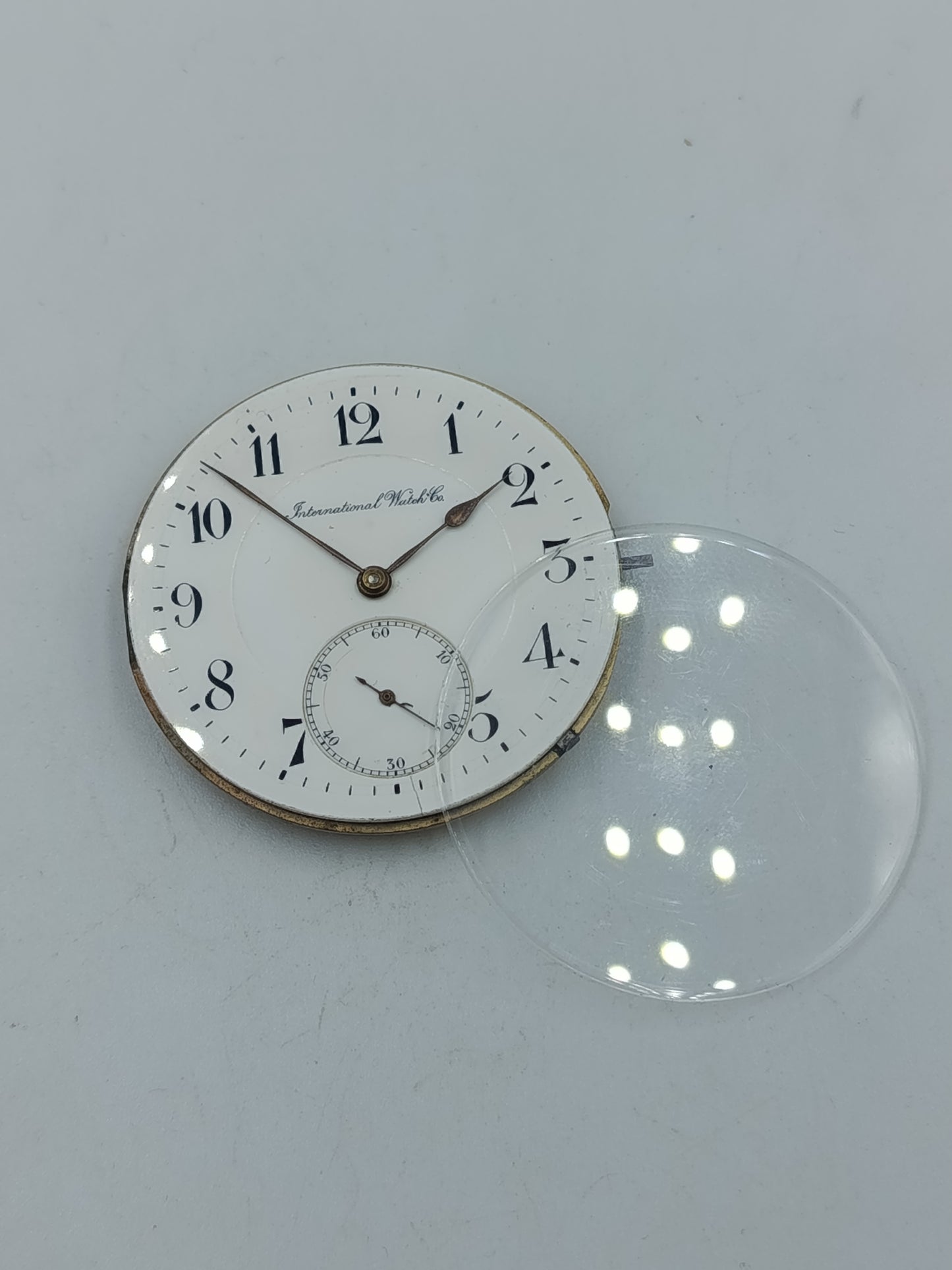 International Watch Co Taschenuhrwerk mit Emaille Zifferblatt