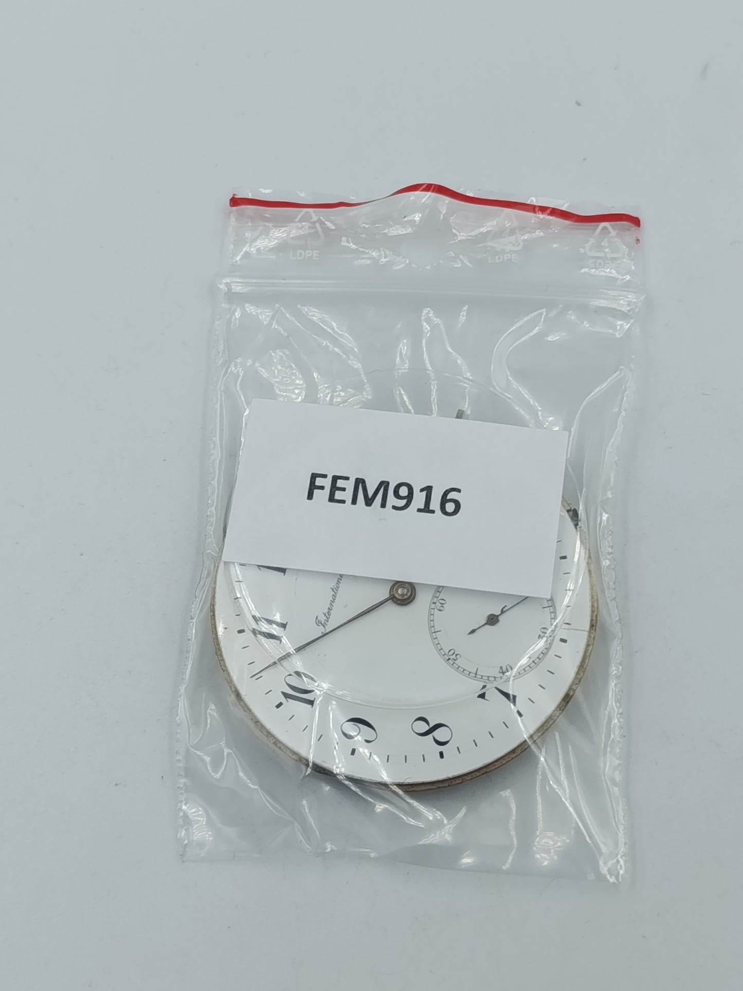 International Watch Co Taschenuhrwerk mit Emaille Zifferblatt