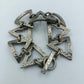 Vintage Armband aus gehämmertem Metall mit geometrischem Design