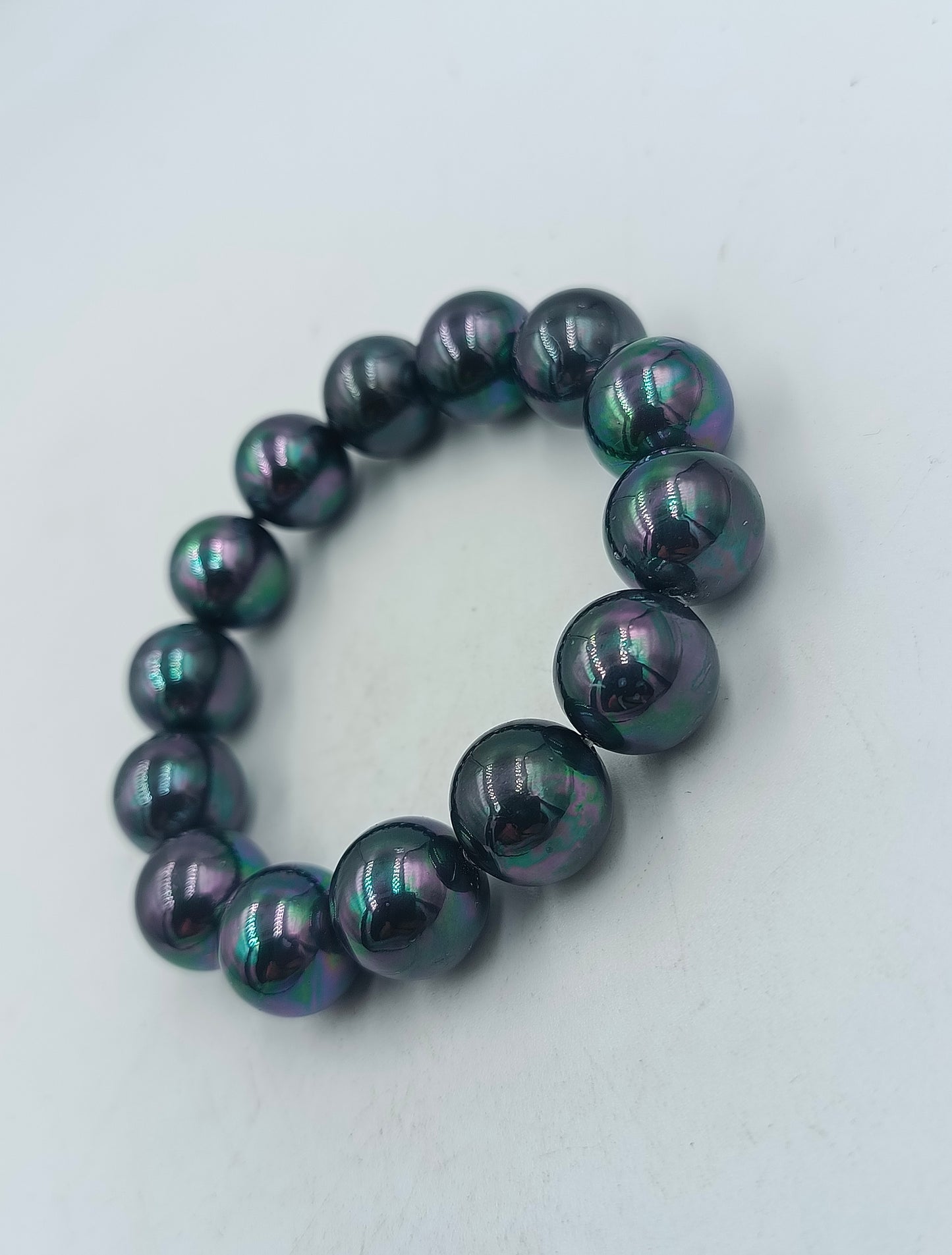 Armband mit schwarzen schimmernden Perlen elastisch Vintage Design