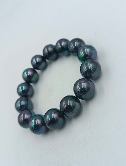 Armband mit schwarzen schimmernden Perlen elastisch Vintage Design