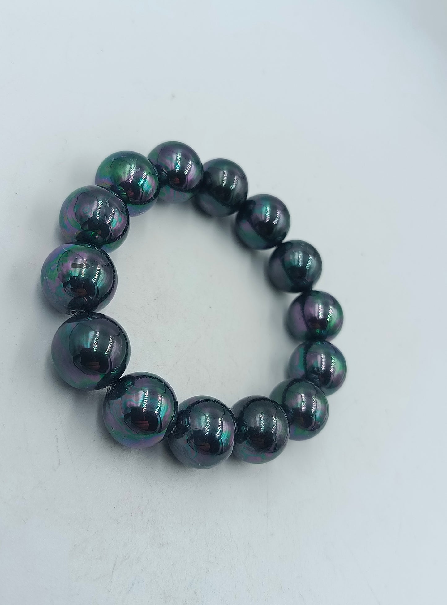 Armband mit schwarzen schimmernden Perlen elastisch Vintage Design