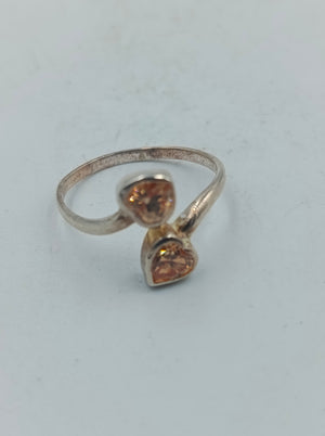 925 Silber Ring mit zwei herzförmigen Champagner Steinen