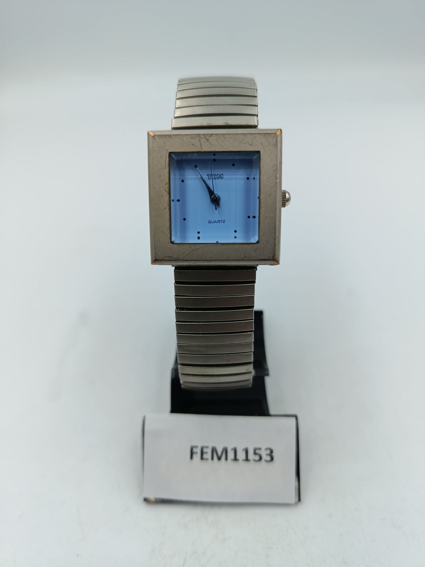 Elegante TCM Armbanduhr mit blauem Zifferblatt und elastischem Armband