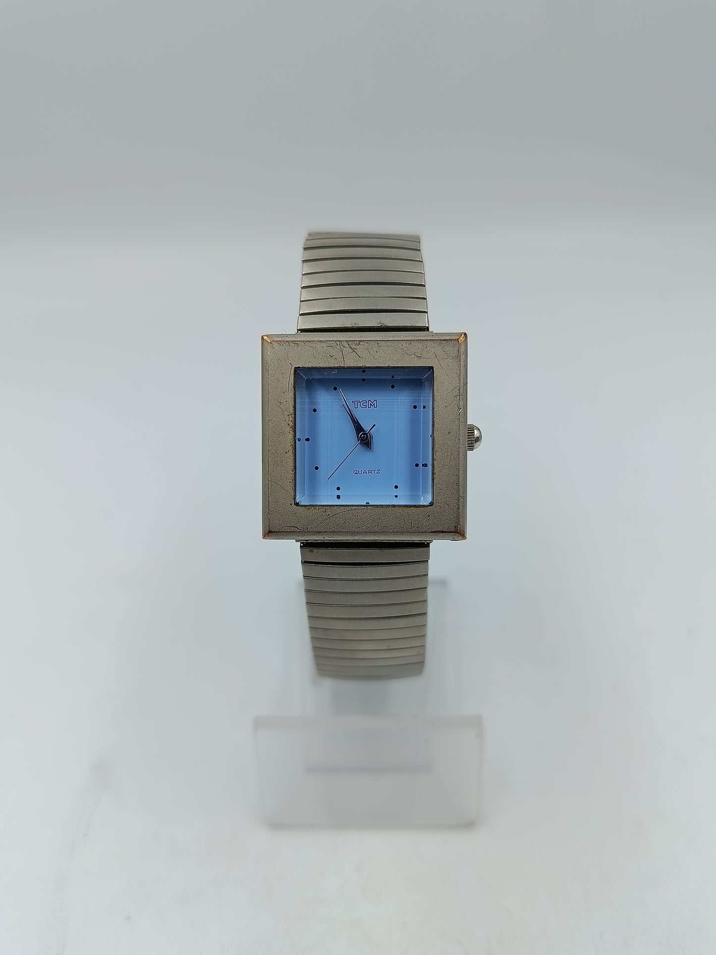 Elegante TCM Armbanduhr mit blauem Zifferblatt und elastischem Armband