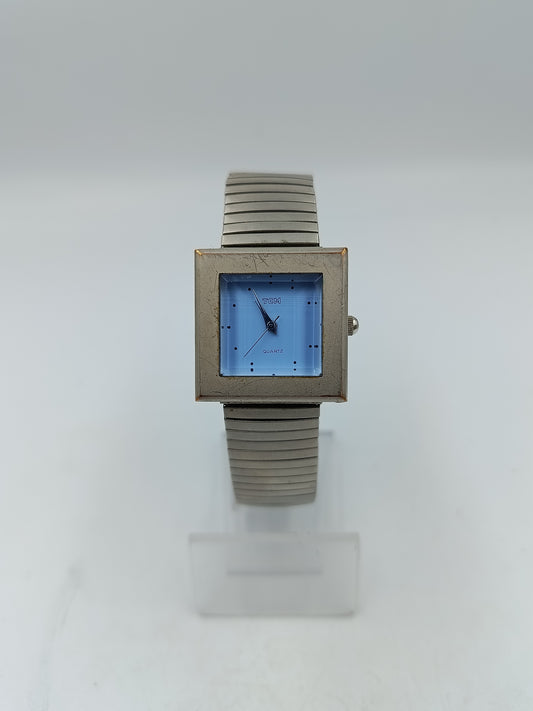 Elegante TCM Armbanduhr mit blauem Zifferblatt und elastischem Armband