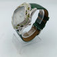 Elegante Damenarmbanduhr Tempo di Donna mit grünem Lederarmband und verziertem Gehäuse