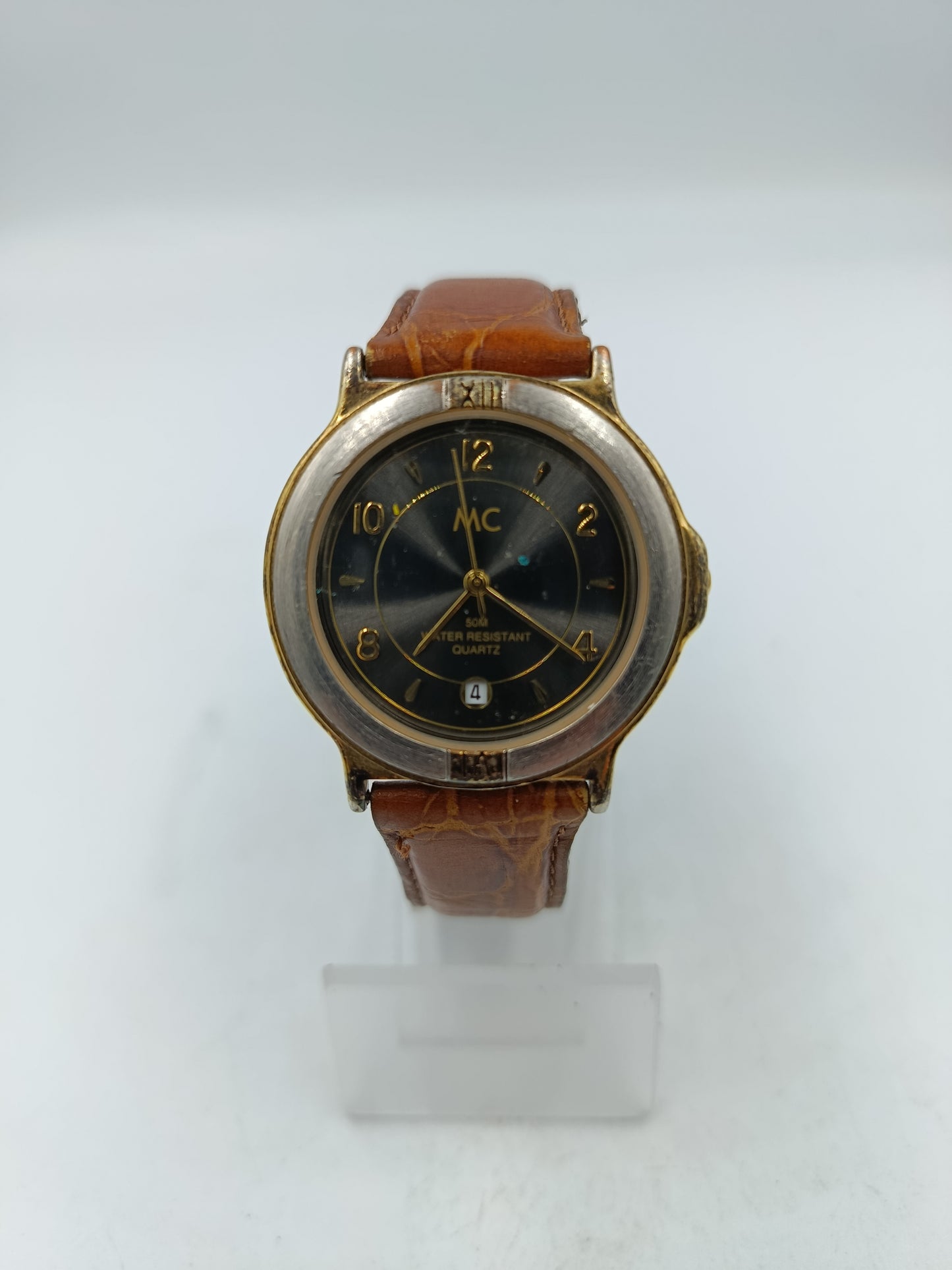 Vintage MC Armbanduhr mit Datumsanzeige und braunem Lederarmband