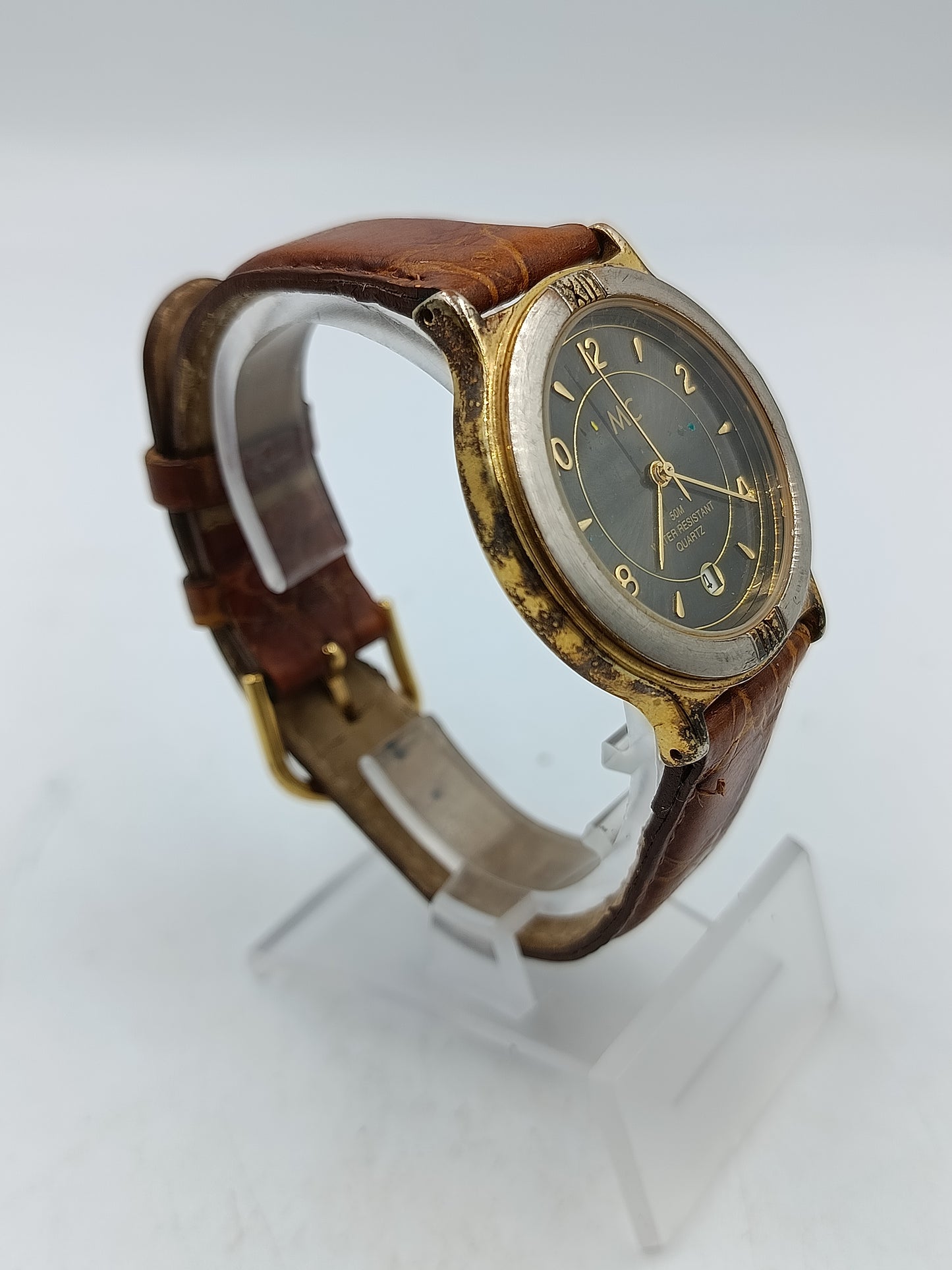 Vintage MC Armbanduhr mit Datumsanzeige und braunem Lederarmband