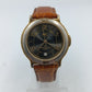 Vintage MC Armbanduhr mit Datumsanzeige und braunem Lederarmband