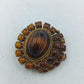 Vintage Brosche mit braunen Cabochons und gedrehter Kordel
