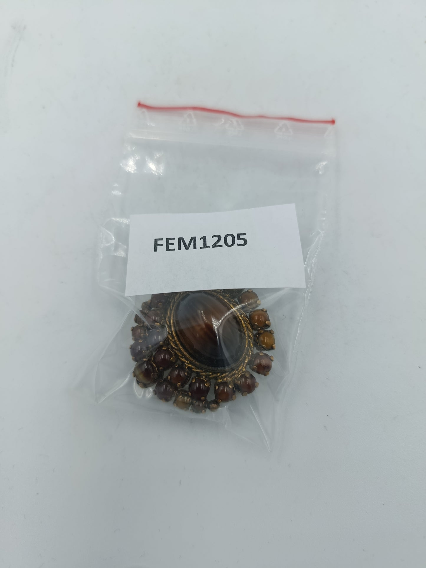 Vintage Brosche mit braunen Cabochons und gedrehter Kordel