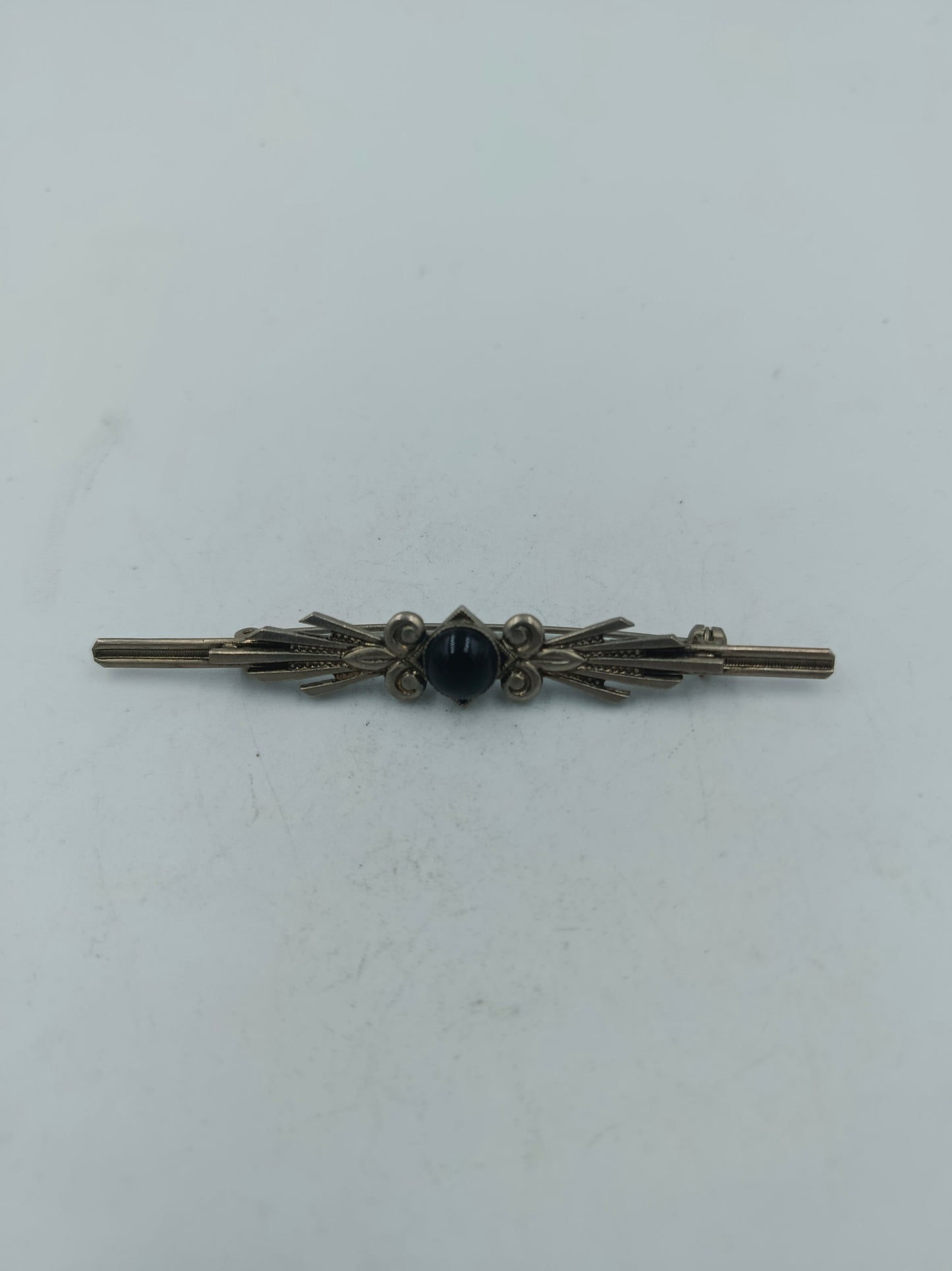 Elegante versilberte Vintage Stabbrosche mit schwarzem Cabochon